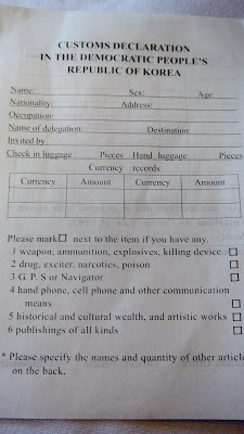 A photograph of a blank North Korean customs declaration form, titled 'CUSTOMS DECLARATION IN THE DEMOCRATIC PEOPLE'S REPUBLIC OF KOREA'.
