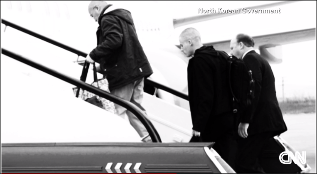 U.S prisoner Matthew Miller boarding U.S. government plane in Pyongyang with top U.S. spy General James Clapper