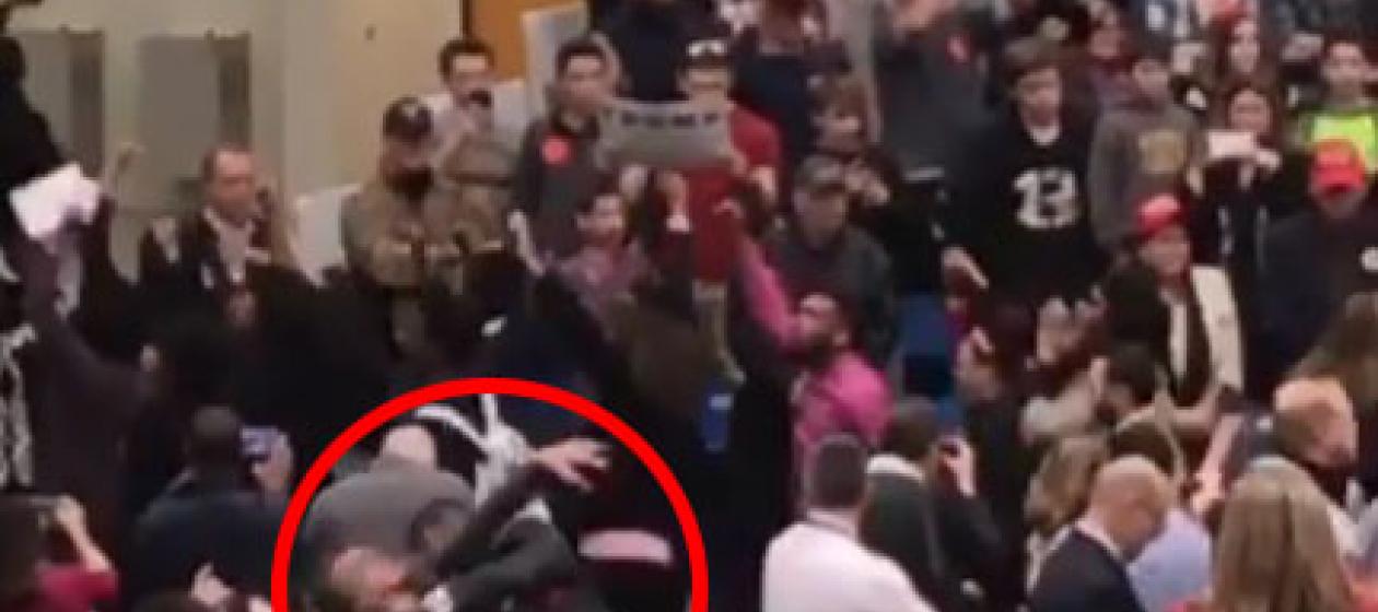 Morris being put in a chokehold by Trump security guards in Virginia today