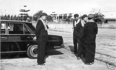 Pol Pot and other top Khmer Rouge leaders stand next to the Mercedes 600 stretch limousine in file pictures from their Killing Fields reign in power