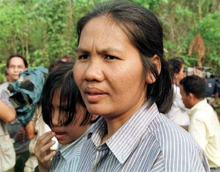 12 year-old Sar Patchata on the day after her father, Pol Pot, died in jungle a guerrilla base near the border with Thailand on April 16, 1998