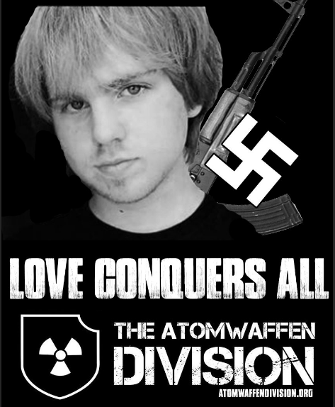 A black and white propaganda graphic for the Atomwaffen Division featuring a young man with shaggy hair, an AK-47, a swastika, and the text "LOVE CONQUERS ALL" and "THE ATOMWAFFEN DIVISION".