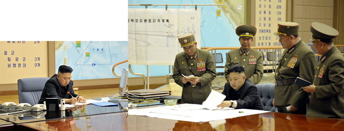 Original March 29 KCNA official photo where Kim Jong-un signed off on the order at a midnight meeting of top generals to put its rocket units on standby to attack U.S. military bases and