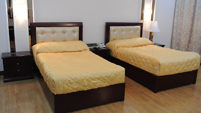 And those beds? Hard as a rock.  Very little in North Korea, it seemed to us, was built to be inviting. Not a rug in the place. 