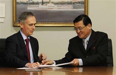 Official signing of AP/North Korean agreement to open up AP Pyongyang news bureau on June 25, 2011 at AP headquarters in New York. AP President Tom Curley (l) and KCNA President Kim Pyong Ho. Kim has since been promoted to deputy head of the Department for Propaganda and Agitation for the Korean Worker's Party, which controls all North Korean official propaganda (AP Photo/Frank Franklin ll)