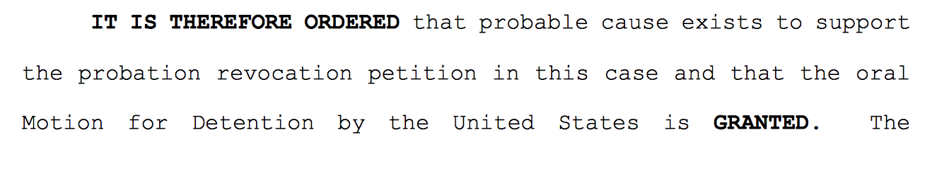 A snippet of a legal document stating 'IT IS THEREFORE ORDERED that probable cause exists to support the probation revocation petition in this case and that the oral Motion for Detention by the United States is GRANTED.'