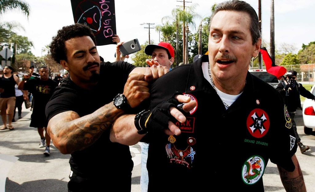 KKK California state Grand Dragon William Quigg being roughed up by counter protestors