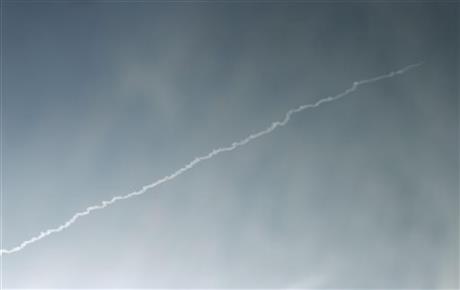 In this image released by Japan's Kyodo News agency, an unidentified object is photographed in the sky from Dandong, China, near the North Korean border, Sunday, Feb. 7, 2016, at the same time a North Korea rocket was allegedly launched.
MAGE: MINORU IWASAKI/KYODO NEWS VIA AP/ASSOCIATED PRESS