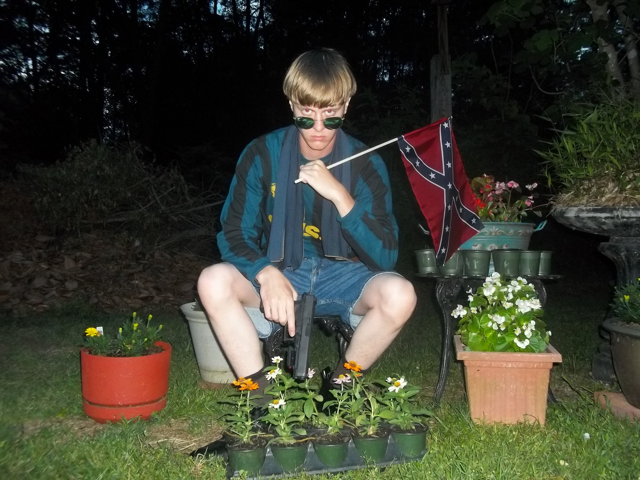 April 27 photographs of Roof taken with both his Glock, and for the first time, a Confederate flag