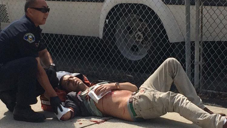 The Anaheim California counter KKK protestor after being stabbed by American Flag