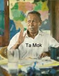 A photograph of an elderly Asian man identified by text as Ta Mok, sitting at a table in front of a map.