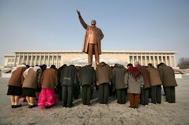 Tourists Bow Paying Homage to Kim Il Sung