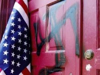 Barker is a chief suspect in active criminal hate crime investigations for painting this Swastika on a Danville, Virginia synagogue in 2011