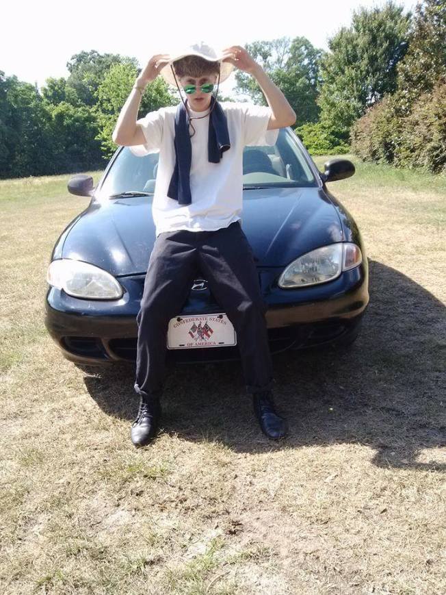Dylann Roof, the shooter who murdered 9 people in a South Carolina church this week. Note the car license plate 