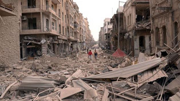 photo released by the Syrian official news agency SANA, Syrians walk through the rubble at the scene where multiple explosions hit the center of Aleppo, Syria on October 3, 2012.  Read more: http://www.upi.com/Top_News/Special/2012/12/13/Scud-attacks-signal-Syrian-regime-alarm/UPI-97451355420939/#ixzz2X0Vgz6Ru 
